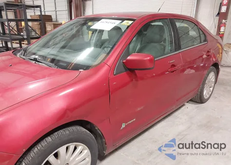 2012 Ford Fusion Hybrid z USA, uszkodzony, nr VIN 3FADP0L39CR288484